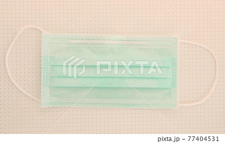 Medical mask on white seamless background, Corona protection. Face mask protection against air pollution, virus, flu and coronavirus. Health care and surgical concept. Medical mask on white seamless background, Corona protection. Face mask protection against air pollution, virus, flu and coronavirus. Health care and surgical concept. 77404531