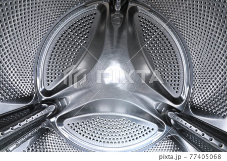 Inside of a washing machine. 77405068