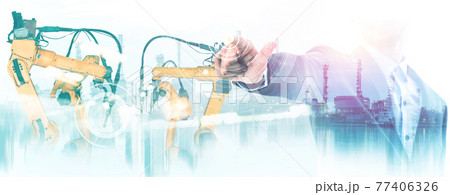 Mechanized industry robot arm and factory worker double exposure 77406326
