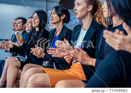 Businessmen and businesswomen celebrating success. 77409062