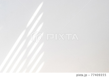 Architectural shadows. Sunlight architecture abstract background with light, black shadow overlay from window on white texture wall. Mockups, posters, stationary, wall art, design presentation. Architectural shadows. Sunlight architecture abstract background with light, black shadow overlay from window on white texture wall. Mockups, posters, stationary, wall art, design presentation. 77409355