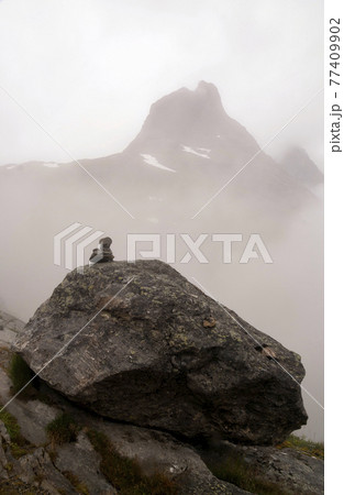 Pile of rocks on the Trollstigen mountain road 77409902