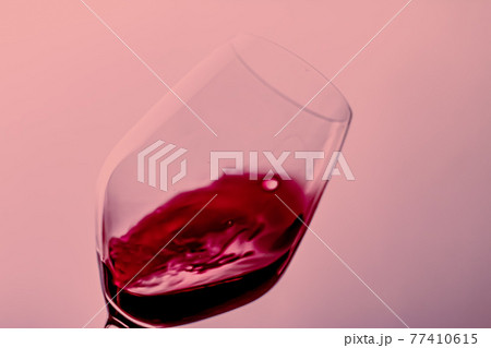 Red wine in crystal glass, alcohol drink and luxury aperitif, oenology and viticulture product Red wine in crystal glass, alcohol drink and luxury aperitif, oenology and viticulture product 77410615