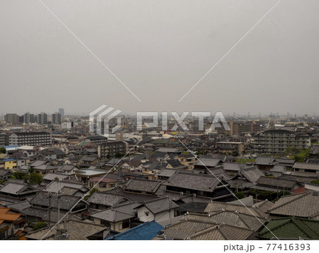 黄砂に覆われた大阪の市街地の風景 黄砂に覆われた大阪の市街地の風景 77416393