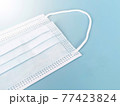 Prevent coronavirus, Healthcare, hygiene, medical or Coronavirus quarantine concept : Medical protective Disposable surgical face mask on blue background.  77423824