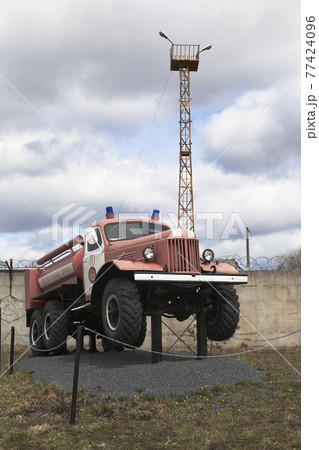Fire Truck AC-40 on chassis ZIL 157A near the firehouse in the city Kadnikov, Vologda region, Russia Fire Truck AC-40 on chassis ZIL 157A near the firehouse in the city Kadnikov, Vologda region, Russia 77424096