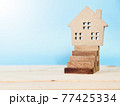 Business, finance, savings, money management, mortgage, property ladder or property loan concept : Wood house model on wood block stacking as step stair with copy space, ready for adding or mock up 77425334