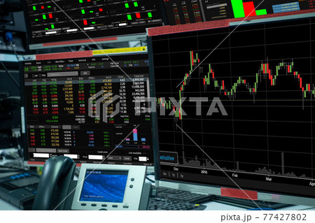 group of stock data monitor analyzing data stock market in monitoring room on the data presented in the chart, forex trading graph, stock exchange trading online, financial investment 77427802