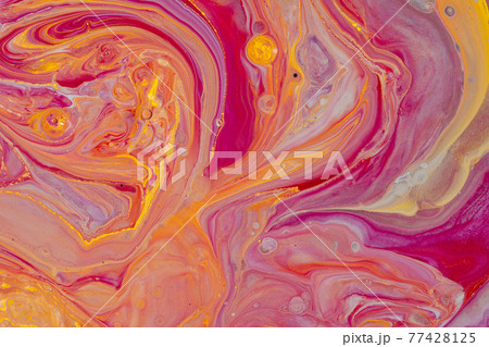 Multicolored paints create a beautiful abstract background. 77428125