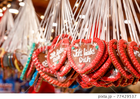 Traditional gingerbread hearts at Christmas market stall in Berlin Germany 77429537