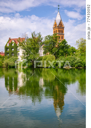 Christ Church reflecting in Isar river Landshut Old Town Bavaria Germany Christ Church reflecting in Isar river Landshut Old Town Bavaria Germany 77430092