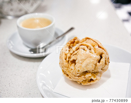 Schneeballen pastry served at bakery cafe in Rothenburg ob der Tauber on Romantic Road Bavaria Germany 77430899