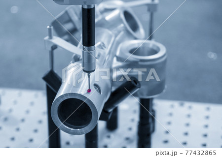 The multi-axis CMM machine checking the automotive aluminum casting parts . The multi-axis CMM machine checking the automotive aluminum casting parts . 77432865