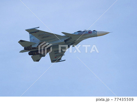 Moscow Russia Zhukovsky Airfield 31 August 2019: The Russian Knights Russkie Vityazi aerobatic team performs a demonstration flight with aerobatics figures of the international aerospace salon 77435509