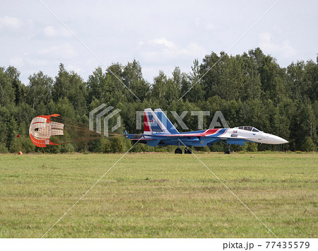 Moscow Russia Zhukovsky Airfield 31 August 2019: The Russian Knights Russkie Vityazi aerobatic team performs a demonstration flight with aerobatics figures of the international aerospace salon 77435579