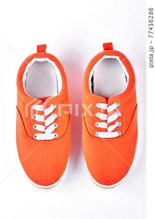 Female orange vans, top view. 77436286