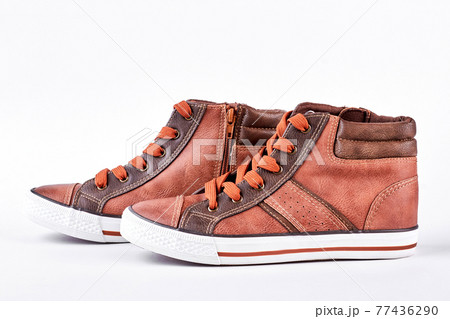 Fashion leather sneakers, white background. Fashion leather sneakers, white background. 77436290