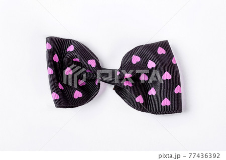 Black patterned bow tie on white background. Black patterned bow tie on white background. 77436392