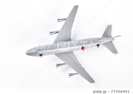 A close up shot of a diecast model plane. 77436401