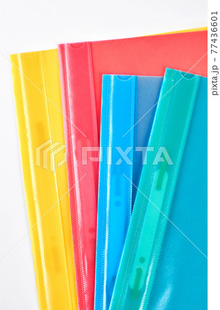 Four colorful transparent folders. 77436601