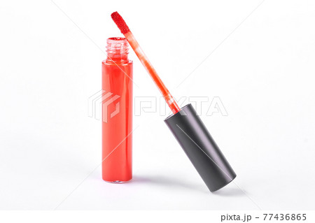 Open red liquid cream lipstick. 77436865