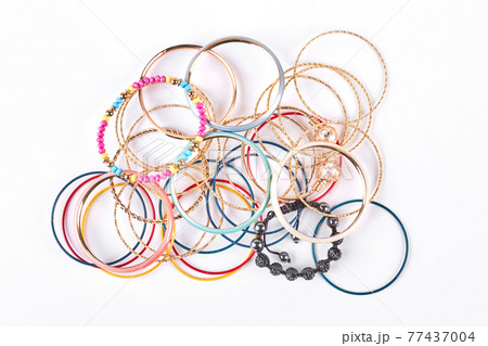 Collection of stylish bracelets, top view. Collection of stylish bracelets, top view. 77437004