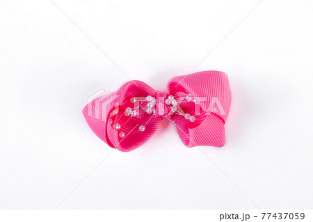 Pink bow for hair, white background. Pink bow for hair, white background. 77437059
