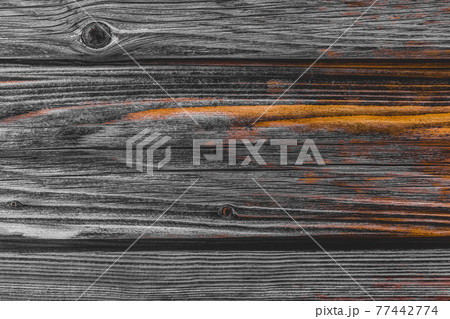 Dark wood texture with orange pattern, abstract old table board or fence background 77442774