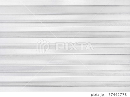 Metal fence, galvanized iron, white wall texture background 77442778