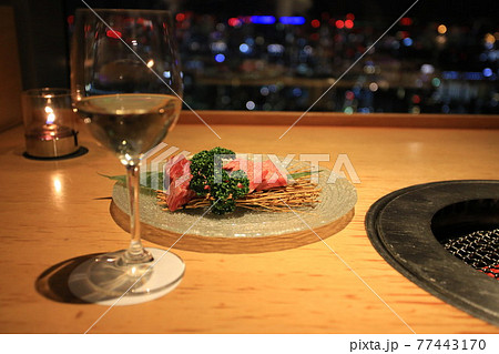 White wine with the night city view of tokyo White wine with the night city view of tokyo 77443170
