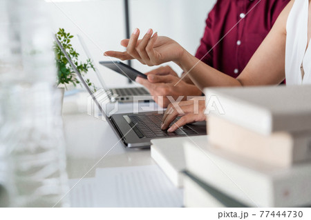 Young students campus helps friend catching up and learning tutoring. People, learning, education and school concept Young students campus helps friend catching up and learning tutoring. People, learning, education and school concept 77444730