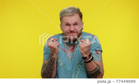 Upset frustrated annoyed irritated man quarreling, asking reason of conflict, why such stubborn 77449099