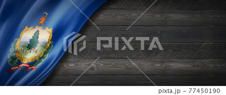 Vermont flag on black wood wall banner, USA Vermont flag on black wood wall banner, USA 77450190