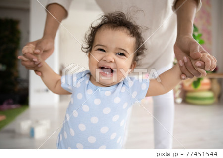 Portrait of cute ethnic baby learn walking 77451544