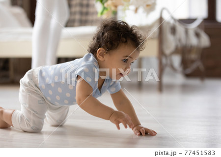 Small African American toddler crawl at home 77451583