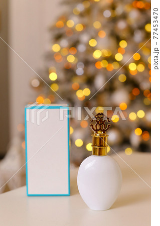 Generic perfume bottles in a gift set on christmas background Generic perfume bottles in a gift set on christmas background 77453470