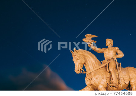 Vitebsk, Belarus. Monument To Algirdas With Falcon In Hand On Background Starry Sky 77454609