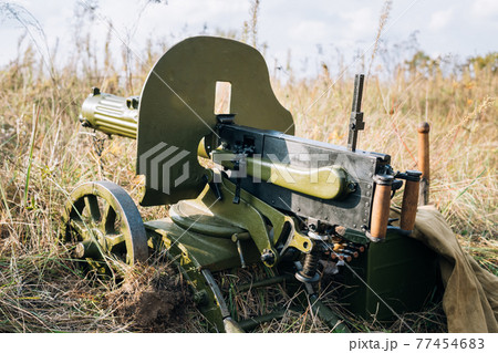 Maxim's Machine Gun Model 1910/30 On A Wheeled Vladimirov's Mount In Grass Maxim's Machine Gun Model 1910/30 On A Wheeled Vladimirov's Mount In Grass 77454683