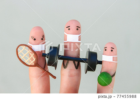 Fingers art of happy people in medical mask from COVID-2019. Concept of family in sports. 77455988