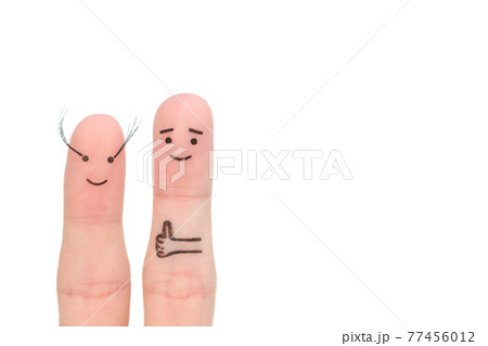 Fingers art of Happy couple. Man likes women's long eyelashes isolated on white. Fingers art of Happy couple. Man likes women's long eyelashes isolated on white. 77456012