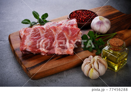 raw pork meat ribs with ingredients for cooking raw pork meat ribs with ingredients for cooking 77456288