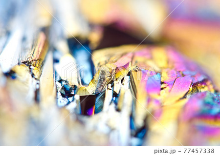 Beautiful colorful background of thin layer of titanium on the surface of quartz. Macro Beautiful colorful background of thin layer of titanium on the surface of quartz. Macro 77457338