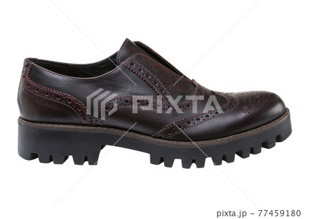 brown fashionable men's leather shoe with a thick sole with protectors, located horizontally, on a white background brown fashionable men's leather shoe with a thick sole with protectors, located horizontally, on a white background 77459180