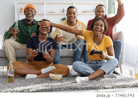 Cute black ladies having video game competition 77461743
