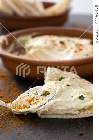 Hummus on black stone Hummus on black stone 77466458