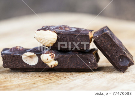 chocolate with hazelnuts chocolate with hazelnuts 77470088