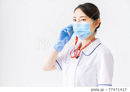 急患の連絡を受ける看護師の写真素材 77471417 Pixta