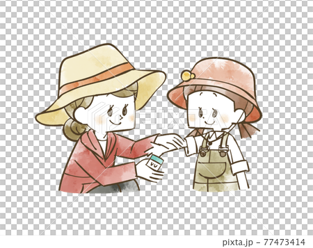 A woman applying sunscreen to a girl's arm 77473414