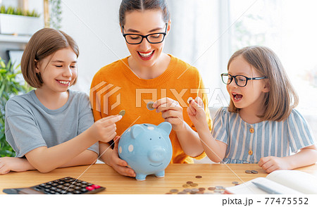 women calculating family budget women calculating family budget 77475552