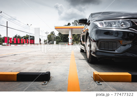 Car Parking Lot and Gas Station, Perspective View of Car Park at Petrol Dispenser Station. Business Auto Service and Fuel Entrepreneur Car Parking Lot and Gas Station, Perspective View of Car Park at Petrol Dispenser Station. Business Auto Service and Fuel Entrepreneur 77477322